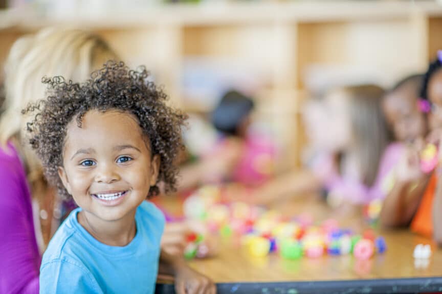 happy african american toddler at preschool