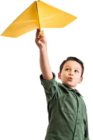 Young boy flys a giant airplane